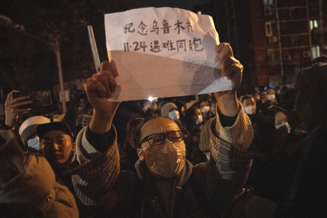 Protester i Beijing 27 november. 