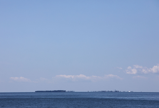 <p>FLAT: Tangier Island er så lav at hadde det ikke vært for trærne ville øya knapt vært synlig i horisonten.</p>
