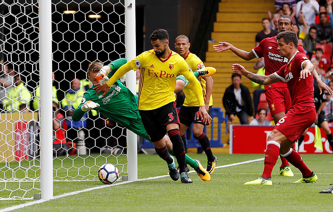 <p>3-3: Miguel Britos kriget inn ett poeng for Watford på overtid i serieåpningen mot Liverpool.</p>