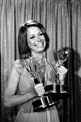 <p>WON EMMY award: Mary Tyler Moore holds the two Emmy awards that she won in 1974.</p>